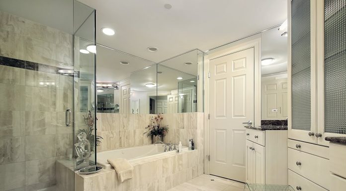 What Shower Designs Do Madison General Contractors Use for Simplicity modern shower remodel